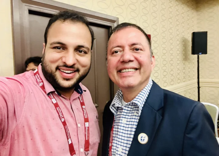 Two conference delegates photographed together