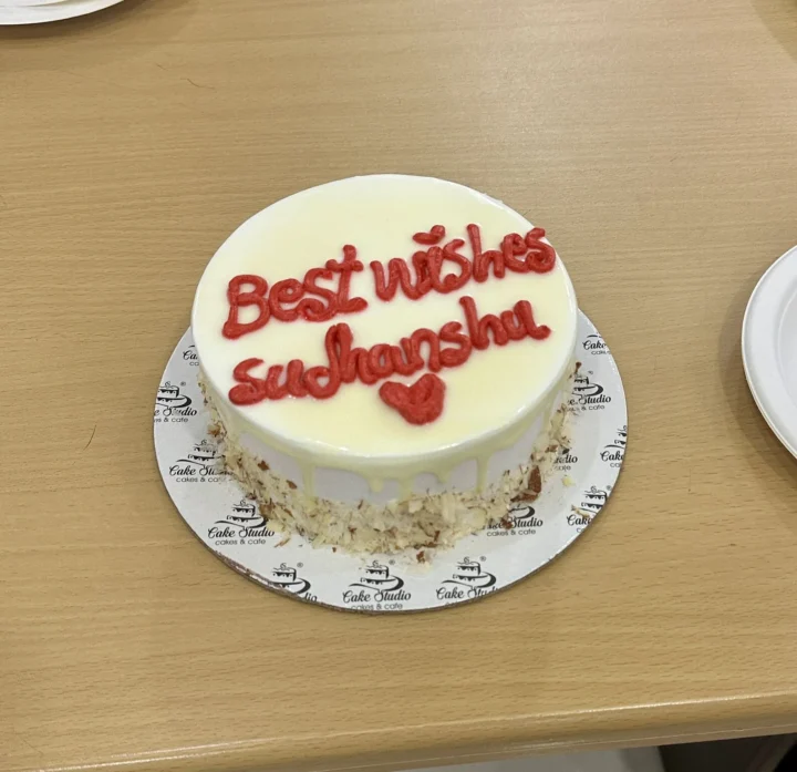 A cake iced with the words Best wishes Sudhanshu