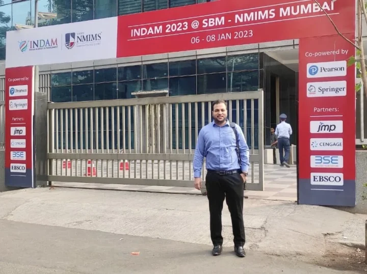 Standing outside the venue for INDAM 2023 at SBM NMIMS Mumbai