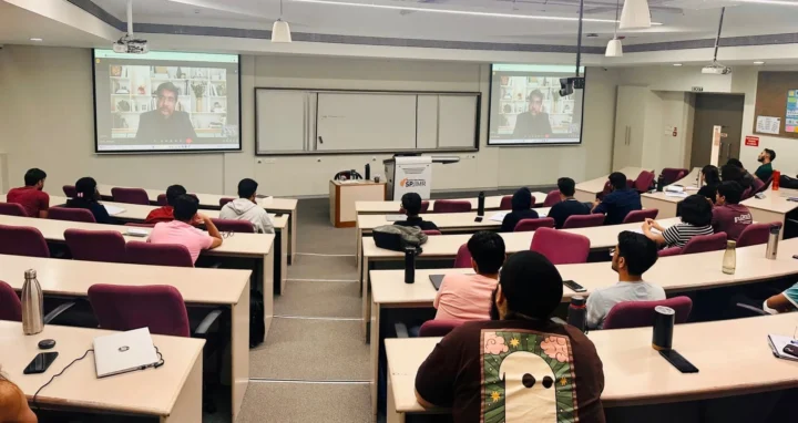 Addressing a seated class from the front of the room