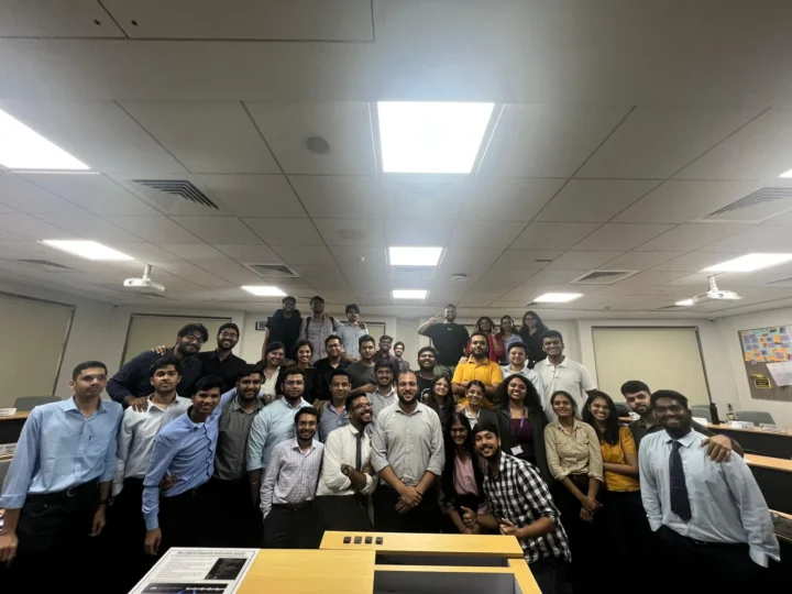 A full classroom of participants photographed from the front of the room